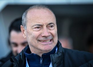Кокала: Левски има качеството да спечели Суперкупата Smiling older man in a dark jacket outdoors, facing slightly to the right, with a blurred background behind him.