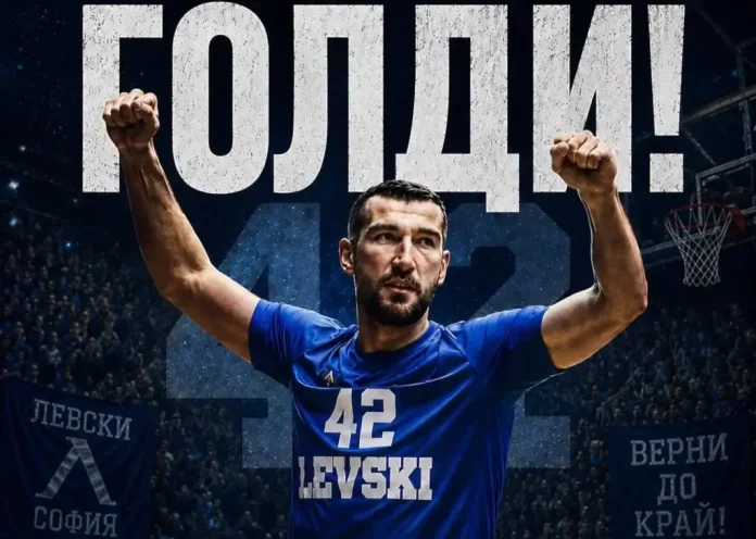 Basketball player in a blue jersey with number 42 raises his fists in victory in a crowded arena.
