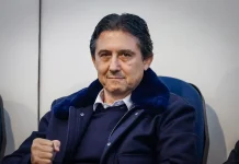 Боримиров преди НЕК: Искам Левски да повтори това, което направи Брюж Man seated in a blue chair wearing a dark coat with a fur collar, looking at the camera with a slight smile.