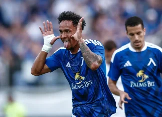 Футболист на Левски попадна в топ 5 на престижна европейска класация Two soccer players in blue celebrate on the pitch; foreground player cups his ears and sticks out his tongue.