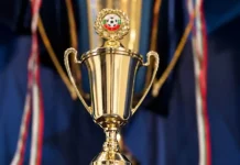 Левски пусна специална шампионска купа за феновете Gold trophy with ornate handles and a circular crest at the top.