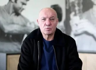 Пламен Николов: Левски може да победи Спартак Плевен и с резервите, но истинският тест ще е в Европа Bald man in a black jacket speaks to the camera in a modern office, with a grayscale mural behind him.