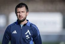 Тасевски за Веласкес: Той е щитът на Левски Man with short dark hair and stubble wearing a navy blue zip-up jacket with Adidas stripes, standing outdoors and looking toward the camera.