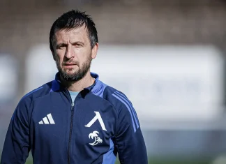Тасевски за Веласкес: Той е щитът на Левски Man with short dark hair and stubble wearing a navy blue zip-up jacket with Adidas stripes, standing outdoors and looking toward the camera.